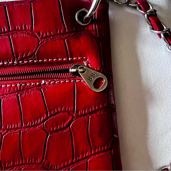 Red with silver hardware crossbody. Cross and angel wings. - Picture 2 of 3